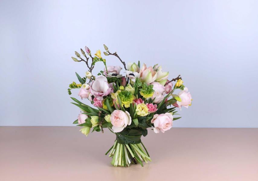 Spring bouquet with sprigs of magnolia