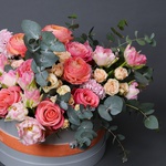 Floral composition with ranunculus and lilac