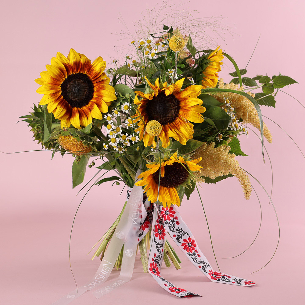 «Sunny Field» is a bouquet of sunflowers and wildflowers