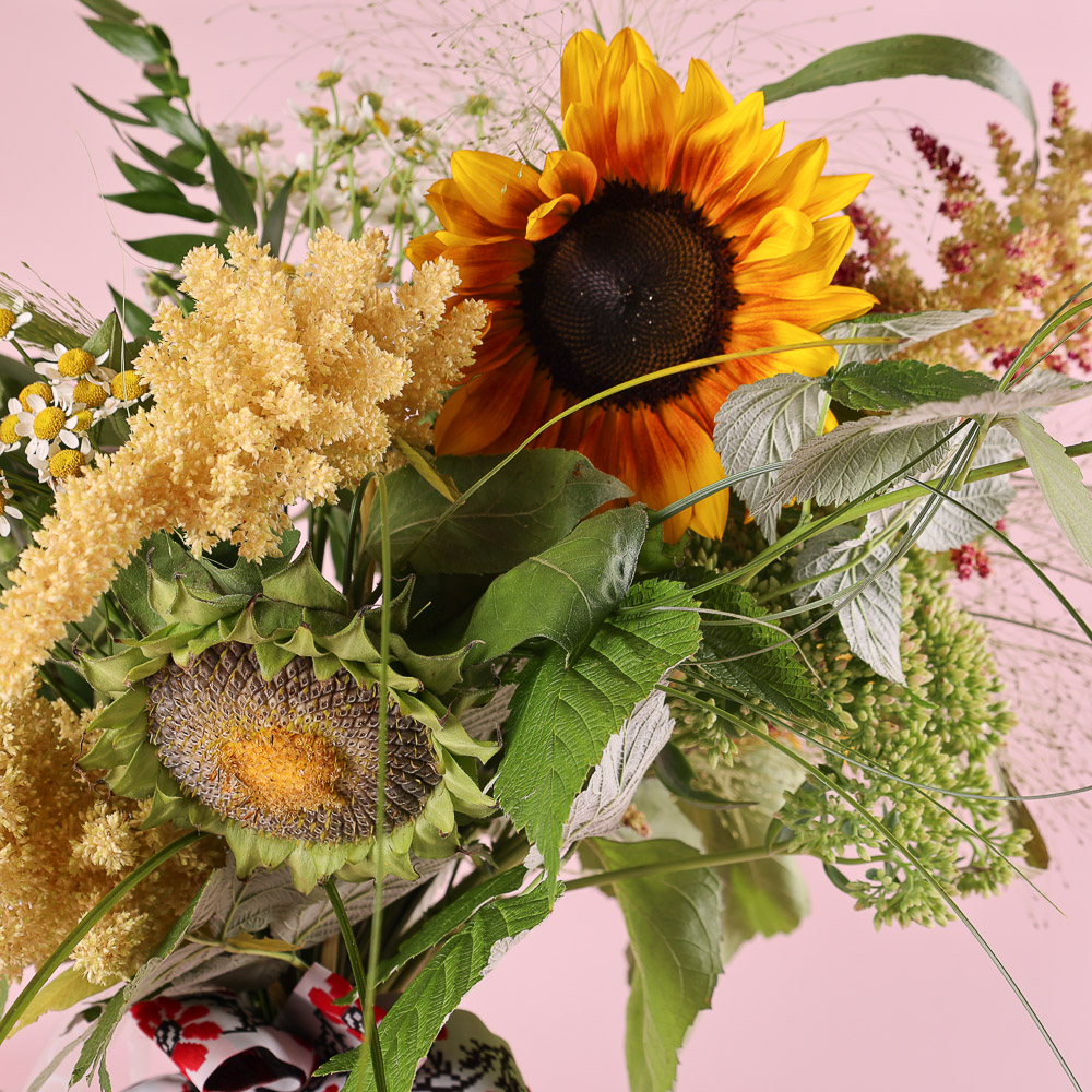 «Sunny Field» is a bouquet of sunflowers and wildflowers