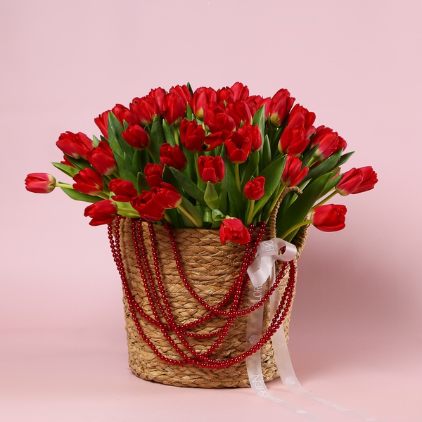 The arrangement «101 Tulips in a Red Necklace»