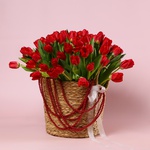 The arrangement «101 Tulips in a Red Necklace»