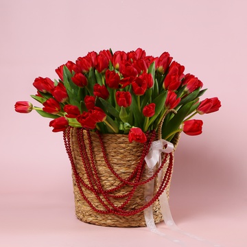 The arrangement «101 Tulips in a Red Necklace»