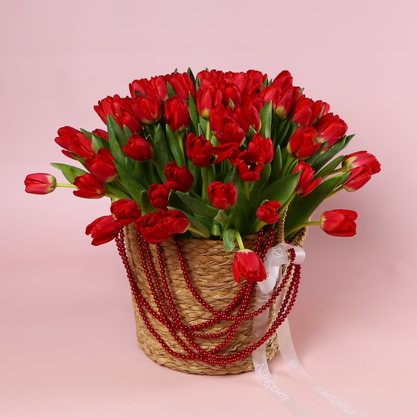 The arrangement «101 Tulips in a Red Necklace»