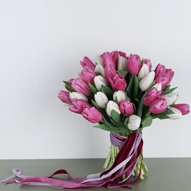 A bouquet of 51 white and pink tulips