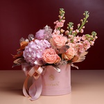 Floral composition in pink and peach tones