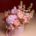 Floral composition in pink and peach tones