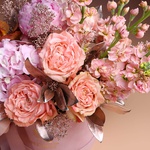 Floral composition in pink and peach tones