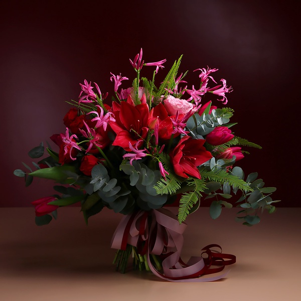 Bouquet with raspberry amaryllis