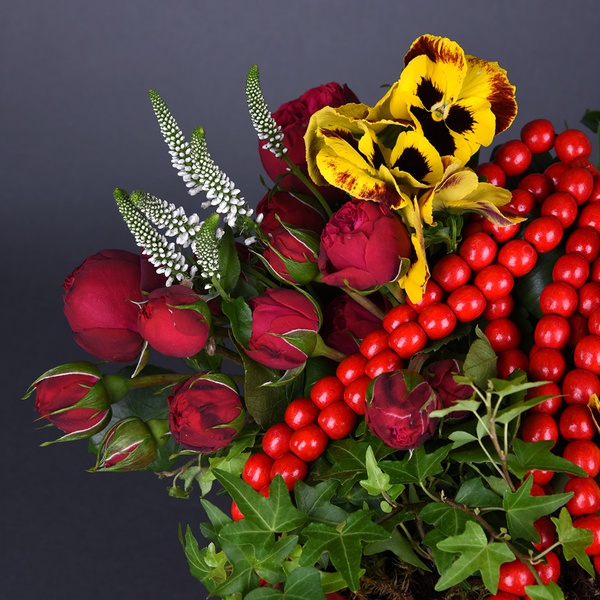 Ethno composition with beads in a red box