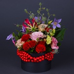 Ethno composition with beads in a black box