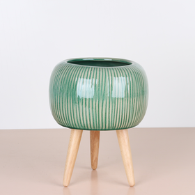 The pot is green on legs HOFF-INTERIEUR