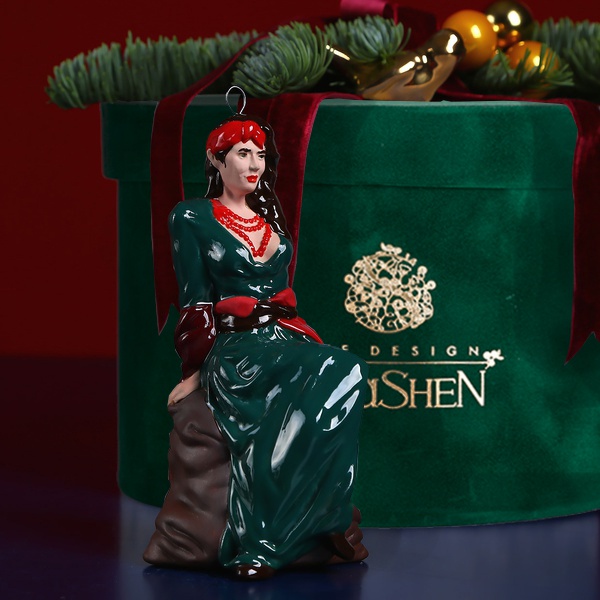 Ceramic figurine "Solokha" in a green dress