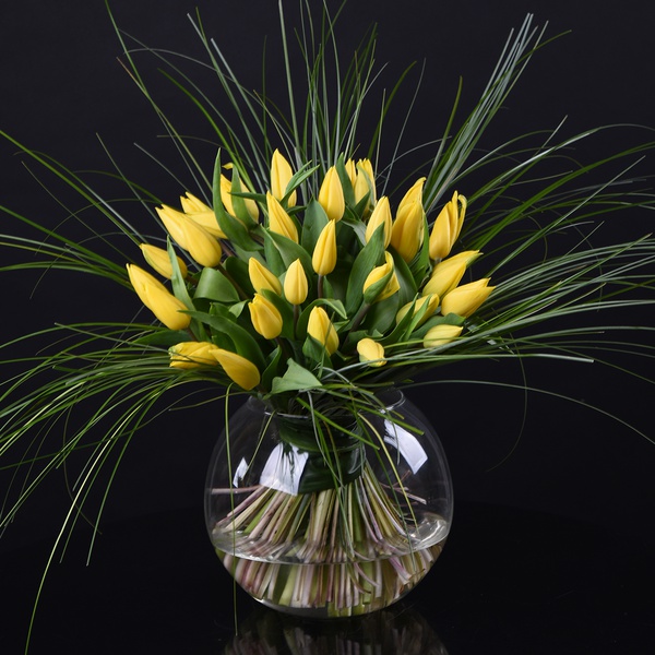 Bouquet of yellow tulips in a vase