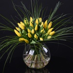 Bouquet of yellow tulips in a vase