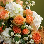 Luxurious bouquet in white and peach tones