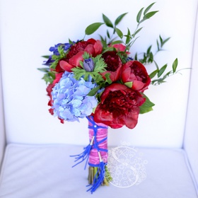 Bridal bouquet with burgundy peonies