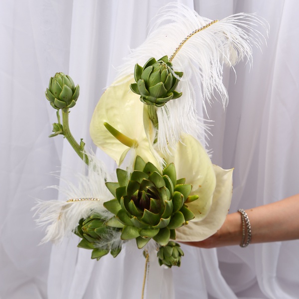 «Art Bride» is a wedding bouquet of anthuriums and artichokes with feathers
