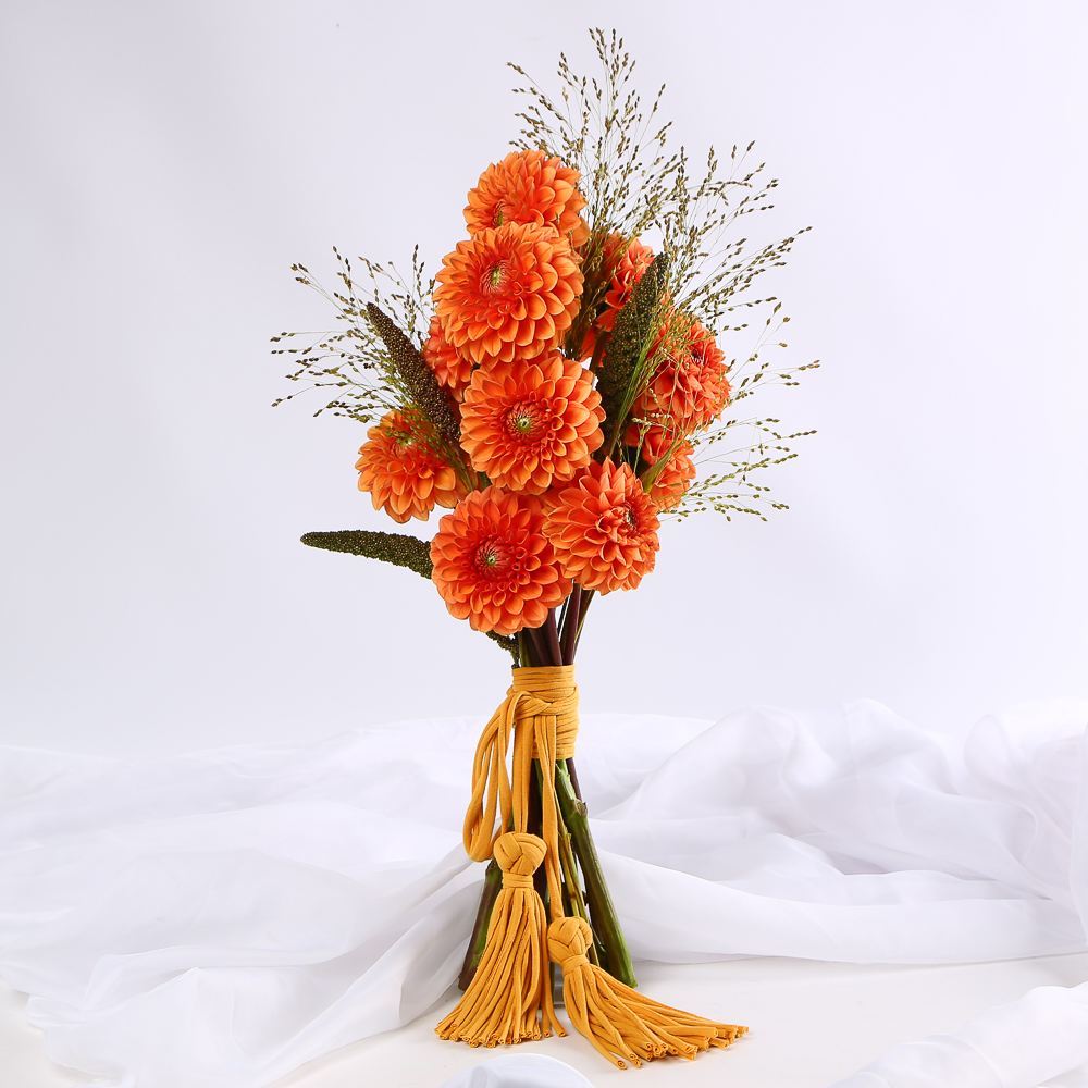«Terracotta Bride» is a wedding bouquet of dahlias with tassels