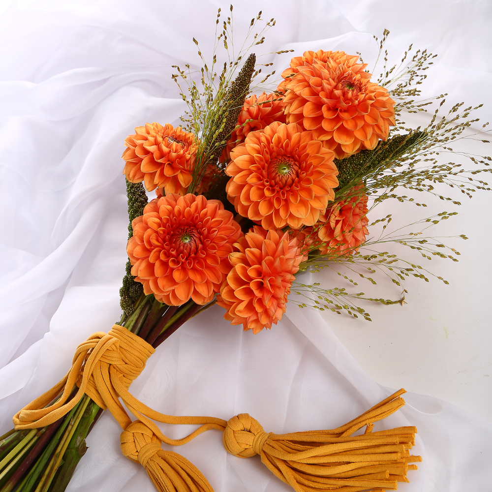 «Terracotta Bride» is a wedding bouquet of dahlias with tassels