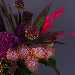 Flower bouquet with gloriosa and vanda