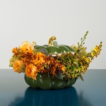 Composition in pumpkin with hydrangea
