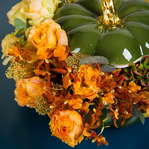 Floral composition in pumpkin with hydrangea