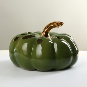 Ceramic pumpkin green with holes and gold