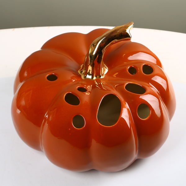 Ceramic pumpkin with holes Orange