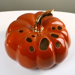 Ceramic pumpkin with holes Orange