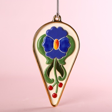 The “Blue Flower” ceramic medallion