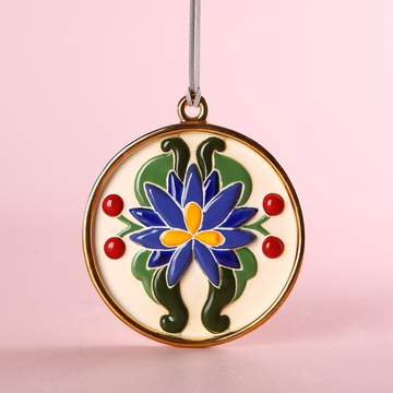 The “Flower of Harmony” ceramic medallion