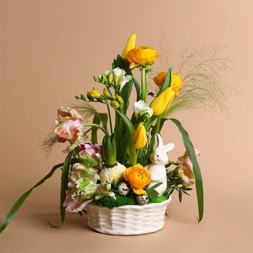 Easter composition in a ceramic basket