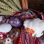 Easter basket with ceramic birds and a towel