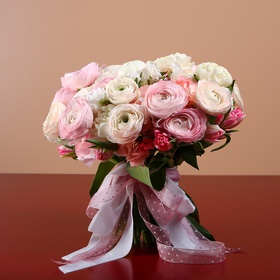 Delicate bouquet with peonies and ranunculus