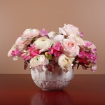 Delicate floral composition in a ceramic vase