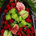 Funeral wreath with red roses