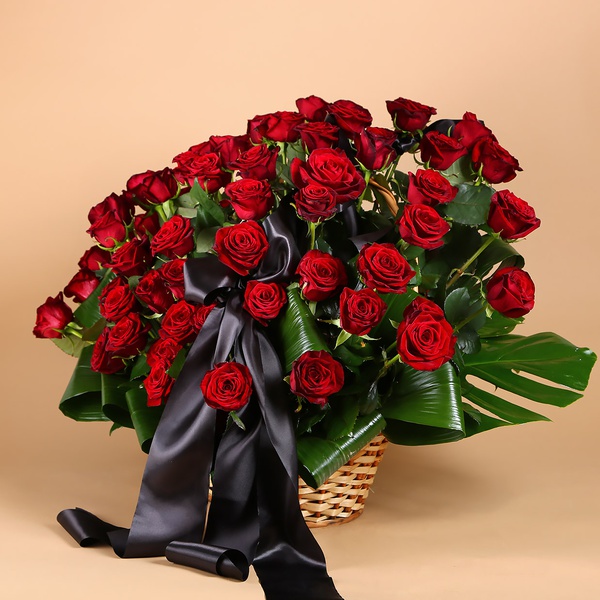 Funeral basket of red roses