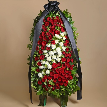 Funeral wreath with white carnation