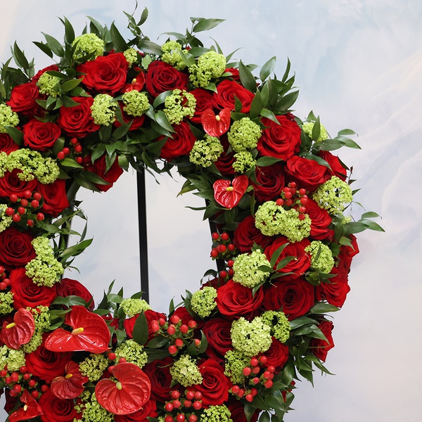 Mourning wreath of rose, viburnum and anthurium