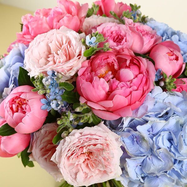 Bouquet with peonies and blue hydrangeas