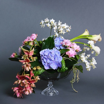 Floral composition with phalaenopsis and medinilla
