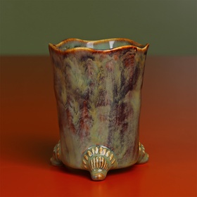 Cache-pot glass on legs in complex glaze