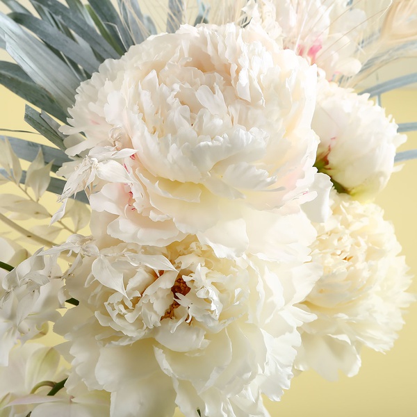 Bouquet with peonies and orchids