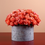 55 peach roses in a hat box