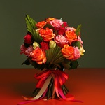 Bouquet of mix roses and palm leaves