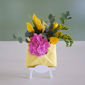Spring composition in an envelope