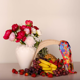 Gift set with peonies and fruits