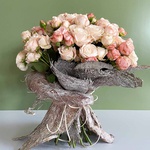Bouquet of spray roses in coconut bark
