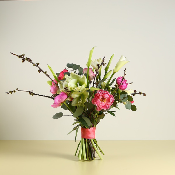 Spring bouquet with peonies and branches